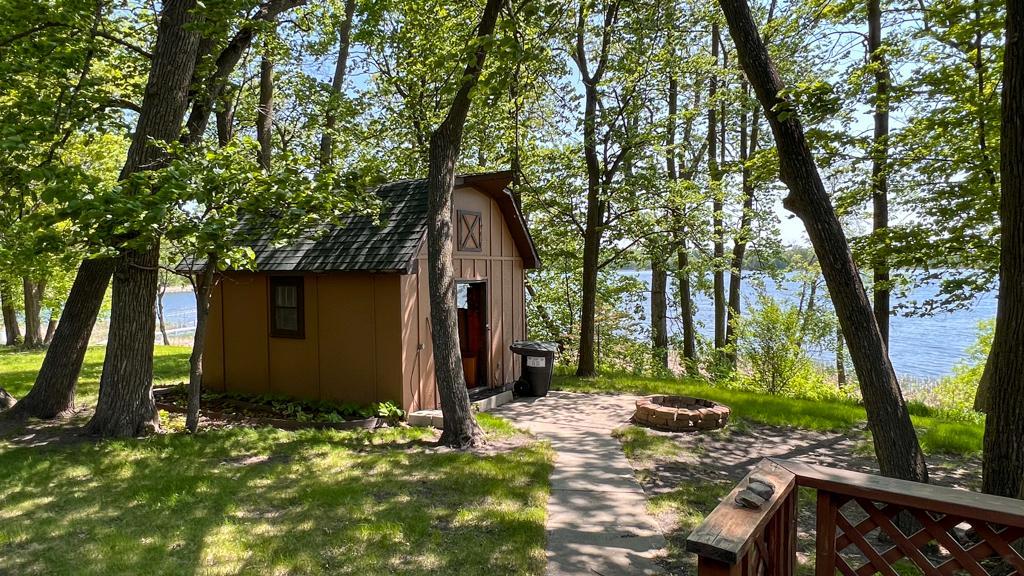 11036 Tall Timbers Rd SW, Garfield, MN 56332 Storage shed included and lakeside fire ring.
