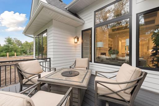 A maintenance-free deck is located off the Sun Room. Photos of a similar model.