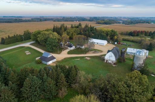 You'll be impressed with how well this property has been maintained and updated!! The 10 acres MOL will be split from a larger parcel. The house has a heated, attached garage, separate home office building, vintage barn, 2 large sheds.