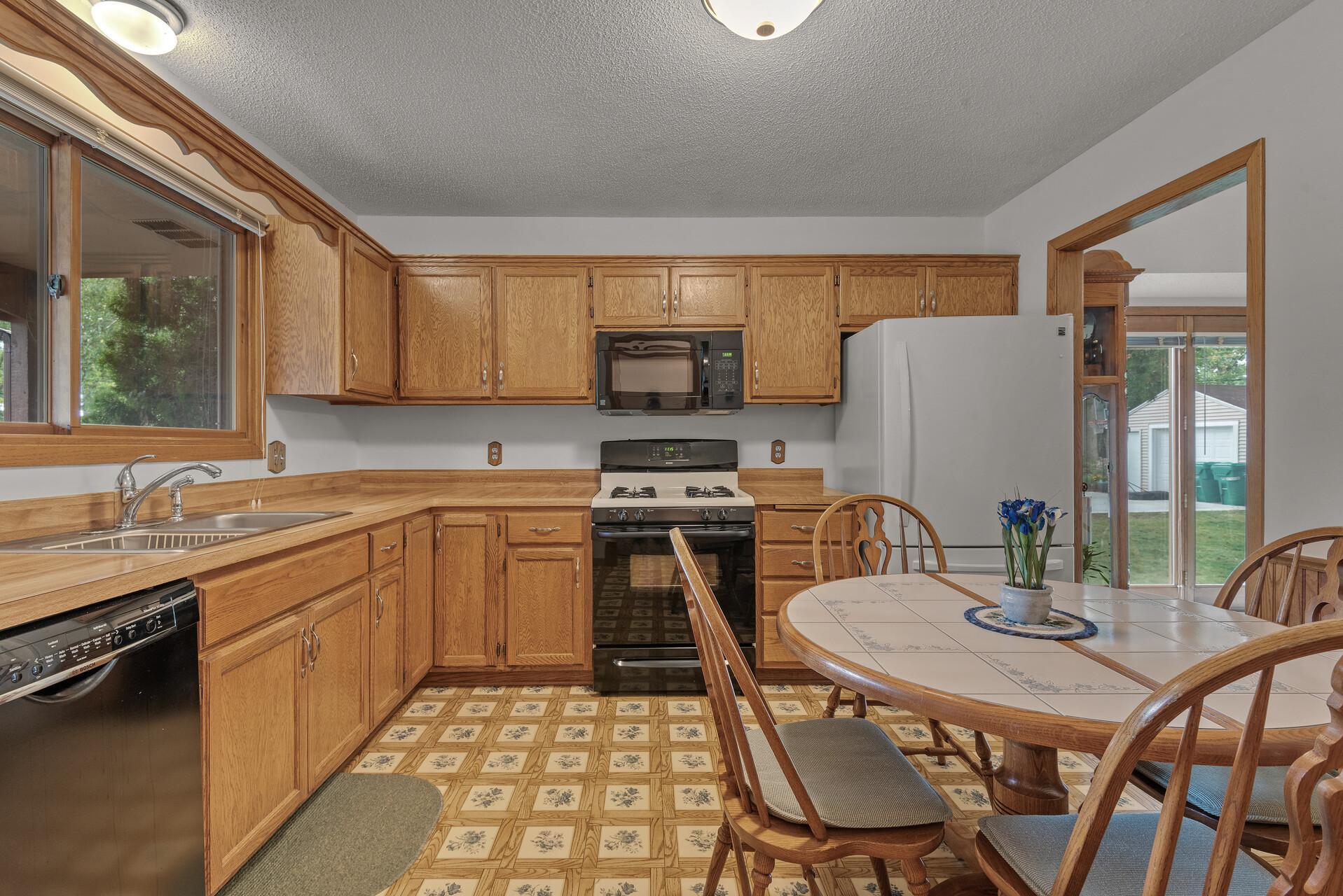 The kitchen has an eat-in space, tons of cabinets for storage that are in excellent condition. Kitchen has a window over the sink facing the front yard. This makes the kitchen bright, open and inviting