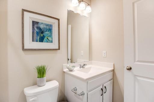 Toward the front of the home, situated between the spare bedrooms, you will find a full bathroom! *Photo of previous model, selections will vary.