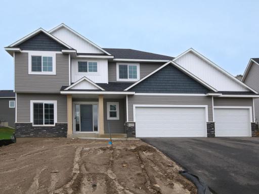 Similar home previously built on different lot - same floor plan - ashpalt driveway, front walk and landscaping/sod included.