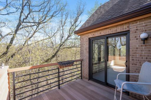 Enjoy the outdoors on your deck looking over the mature trees!
