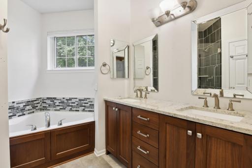 Recently updated featuring double sinks, soaking tub, and shower.