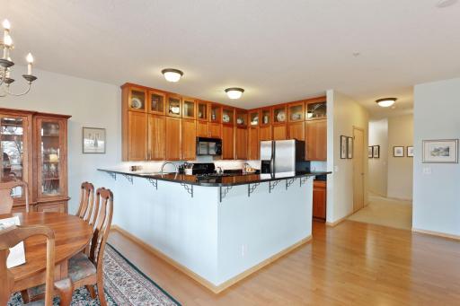Open to the kitchen, you'll find serving meals is a breeze with the expanses of countertops.