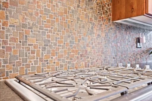 You will find lovely, details and finishing touches like this kitchen backsplash throughout the home.