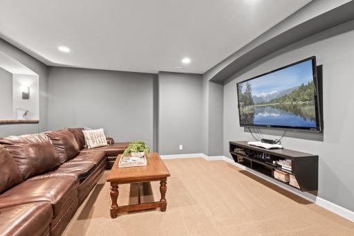 The theater room is the perfect location for family movie night or to relax and enjoy a Sunday afternoon football game.