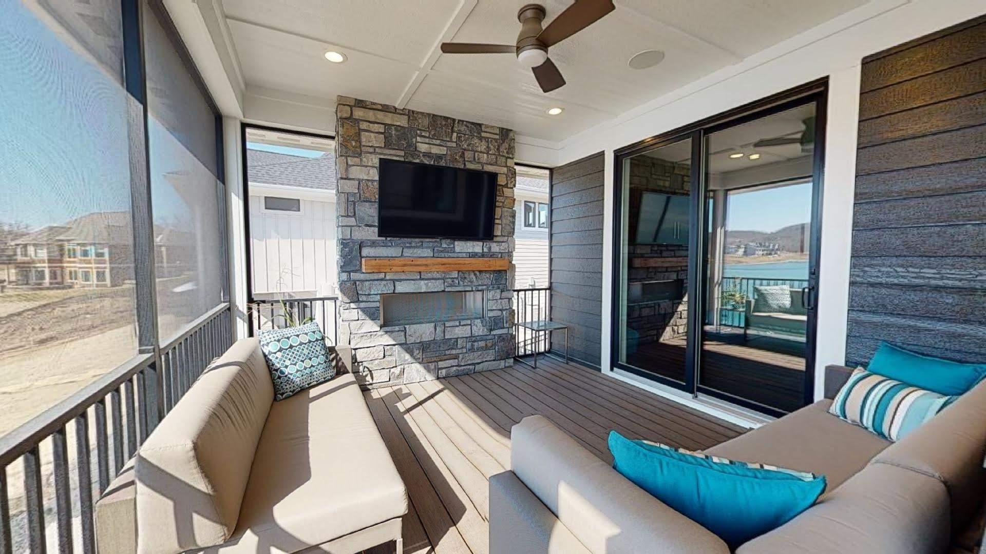 Relax On The Screened In Porch with TV & Fireplace
