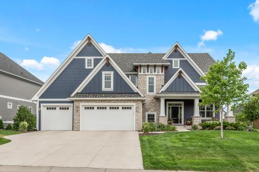 This stunning home is only steps from Lake Minnetonka! Includes boat slip and private lake access, plus a fantastic community clubhouse with outdoor pool and more!