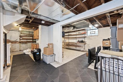 Unfinished basement. A great spot for storage or a in home gym.