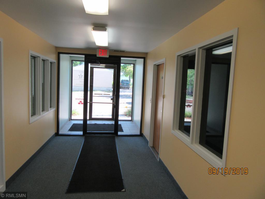 The office that is for rent is adjacent to the east entrance from the parking lot.