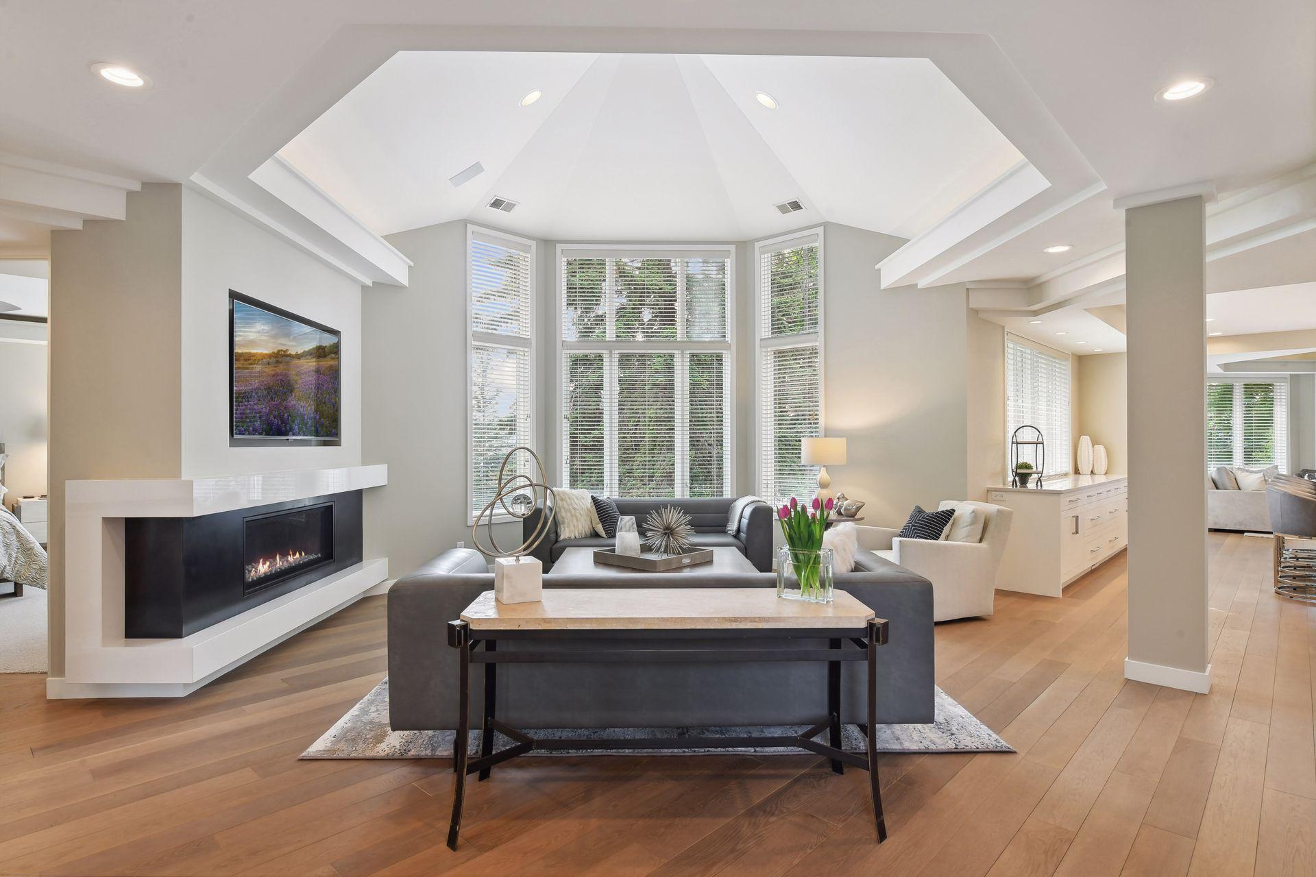 Stunning wall of windows fills the room with natural light.