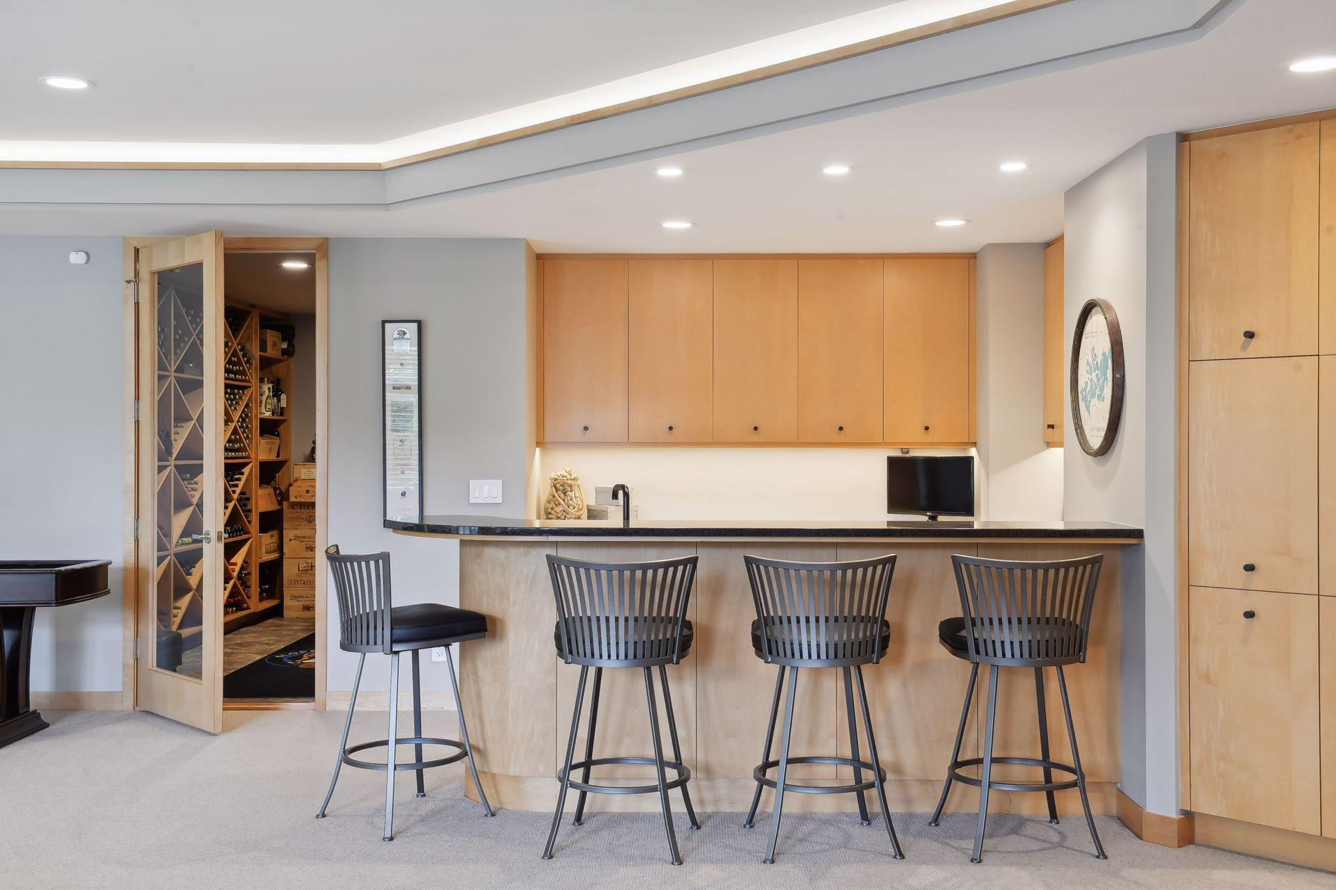 Amazing wine cellar next to the lower level wet bar.