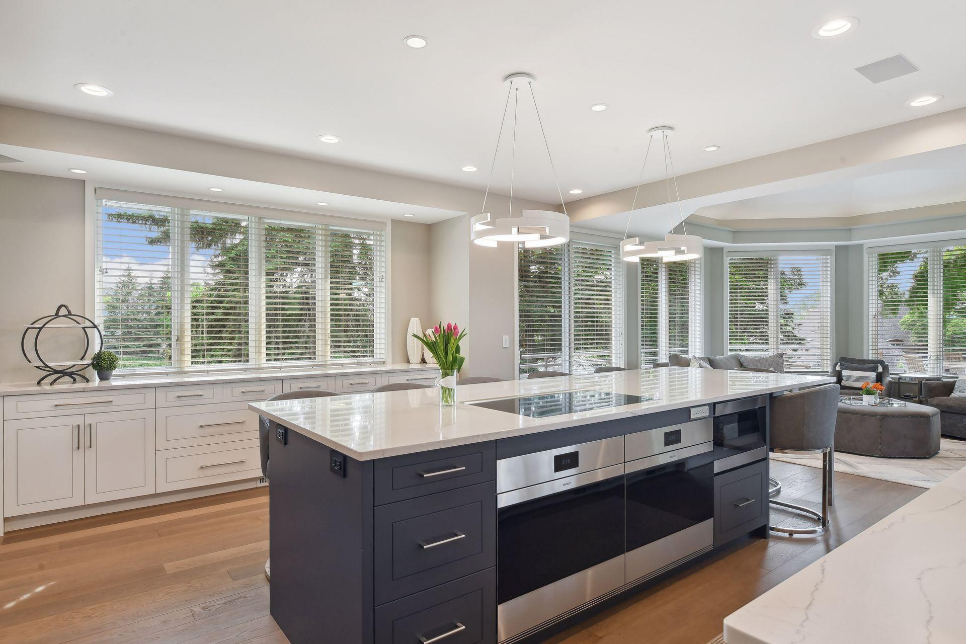 Dual Wolf ovens! Plus microwave in center island.