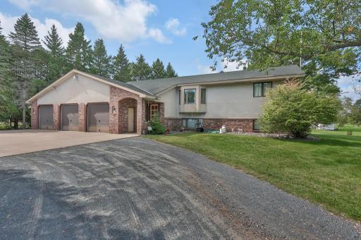 One owner home is built solid. Large concrete apron in front of the garage.