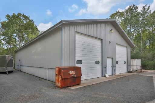 40' x 72' pole building with 12' roll up doors, concrete floor, electric. Plenty of room for motor home, boats, and all the toys or a great building for collector cars or at home business.