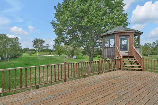 View of the deck and gazebo facing west to rear of the property. Nothing says private like a 50 acre back yard. Maybe a private par 3 golf course? Endless possibilities.
