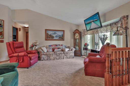 Vaulted living room. Neutral colors throughout.