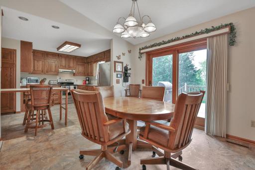 Additional view of the dining and kitchen.