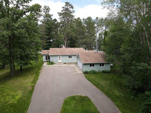 Roadside of Home with Asphalt Driveway.jpg