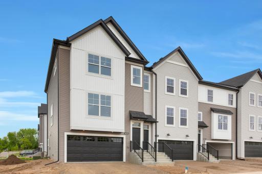 Move-In Ready End-Unit Townhome! Savanna Plan. 3 bedrooms/ 2.5 bathrooms/ finished lower recreation room/ 2-car garage.