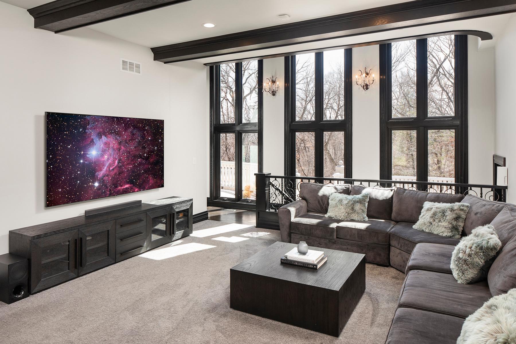 Main floor family room with access to a semi-circular 3 season porch.
