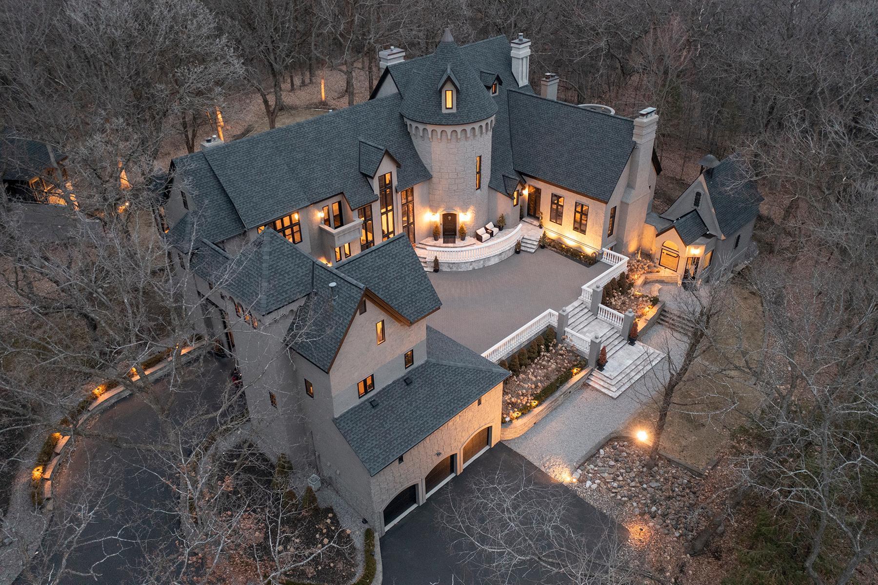 Secluded 2.6 acre estate with 7 garage stalls.