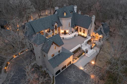 Secluded 2.6 acre estate with 7 garage stalls.