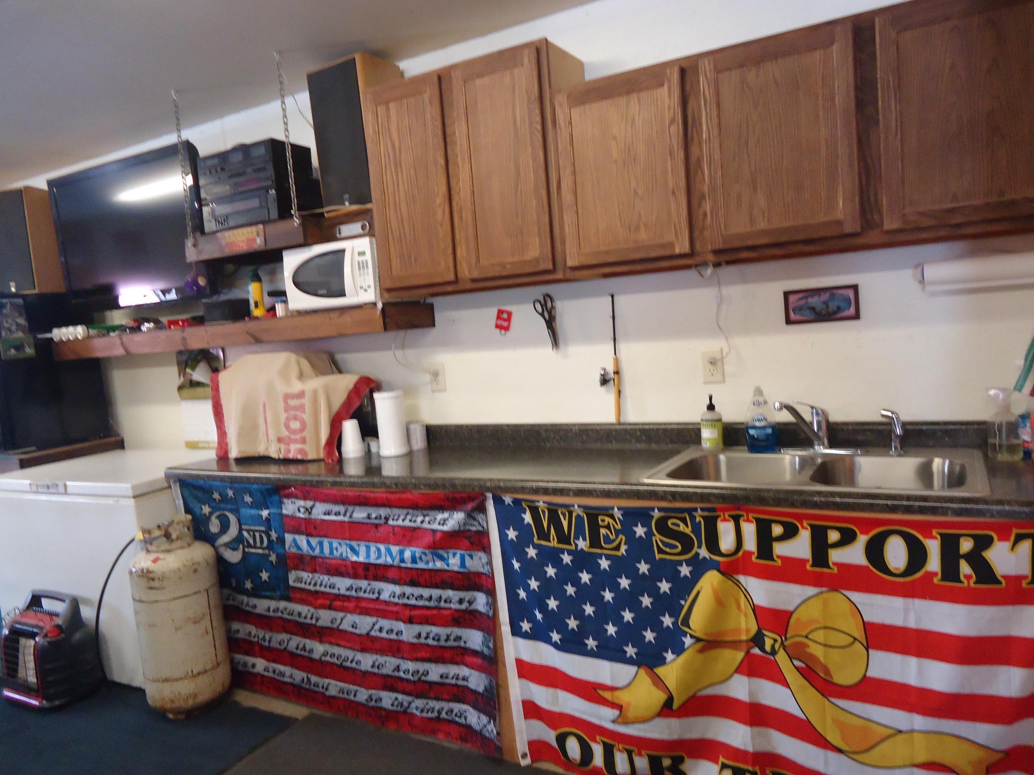 Sink and cabinets in attached garage