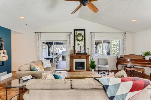 Photo for 410 Lancaster Lane N, Champlin, MN 55316 - Listing #6184032 Vaulted ceilings in the living room create an inviting atmosphere!