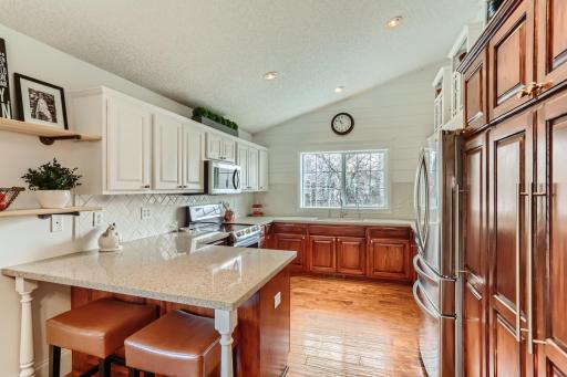 Photo for 410 Lancaster Lane N, Champlin, MN 55316 - Listing #6184032 Your kitchen features updated cabinetry, quartz countertops, and stainless steel appliances! Also included is a Kinetico reverse osmosis water purification system for you to enjoy!
