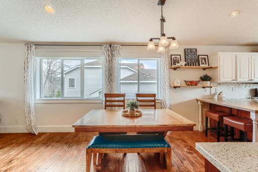 Photo for 410 Lancaster Lane N, Champlin, MN 55316 - Listing #6184032 Look at the natural light coming in through the double windows! Note the additional seating at the kitchen counter.