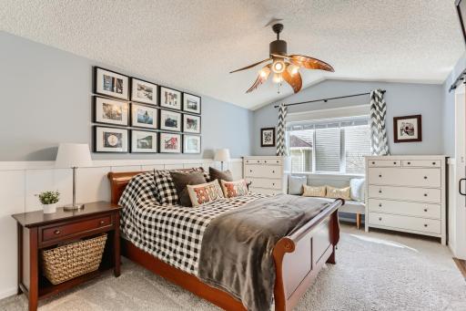 Photo for 410 Lancaster Lane N, Champlin, MN 55316 - Listing #6184032 The primary bedroom features vaulted ceilings, wainscoting, and brand new carpet!