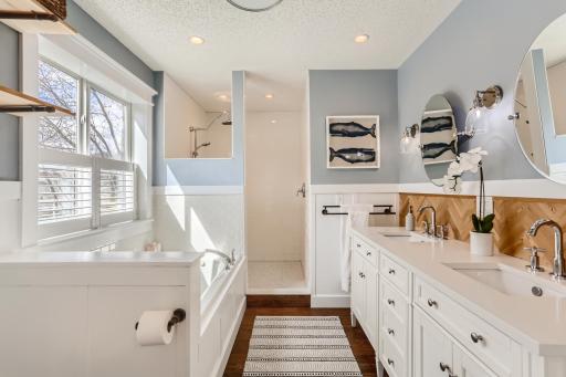 Photo for 410 Lancaster Lane N, Champlin, MN 55316 - Listing #6184032 Welcome to your private oasis! Sellers expanded this private bathroom to have a large shower, tub and double sink vanity.