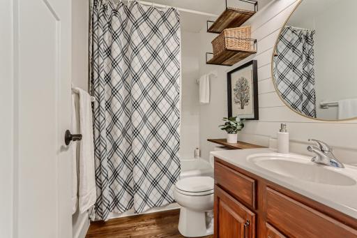 Photo for 410 Lancaster Lane N, Champlin, MN 55316 - Listing #6184032 The shared full bathroom upstairs has been updated to today's finishes!