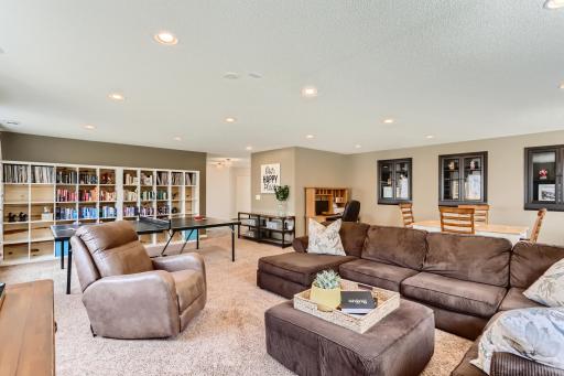 Photo for 410 Lancaster Lane N, Champlin, MN 55316 - Listing #6184032 Anyone up for a game or a movie night? Check out the built-in's on the right. Note: the large white cubbies shelves will be staying with the home.