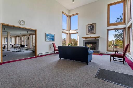 Common welcoming area + fireplace.