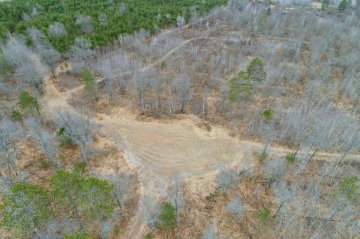 Cleared area perfect for separate pole building or guest cabin (separate PID so well and septic could be added)