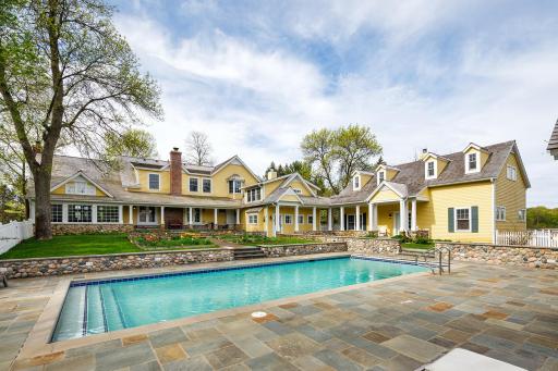 English courtyard garden, heated pool and spa, gathering spaces - direct access to primary home, guest house, and pool house.