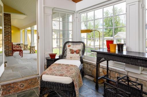 Step out onto blue stone terrace.