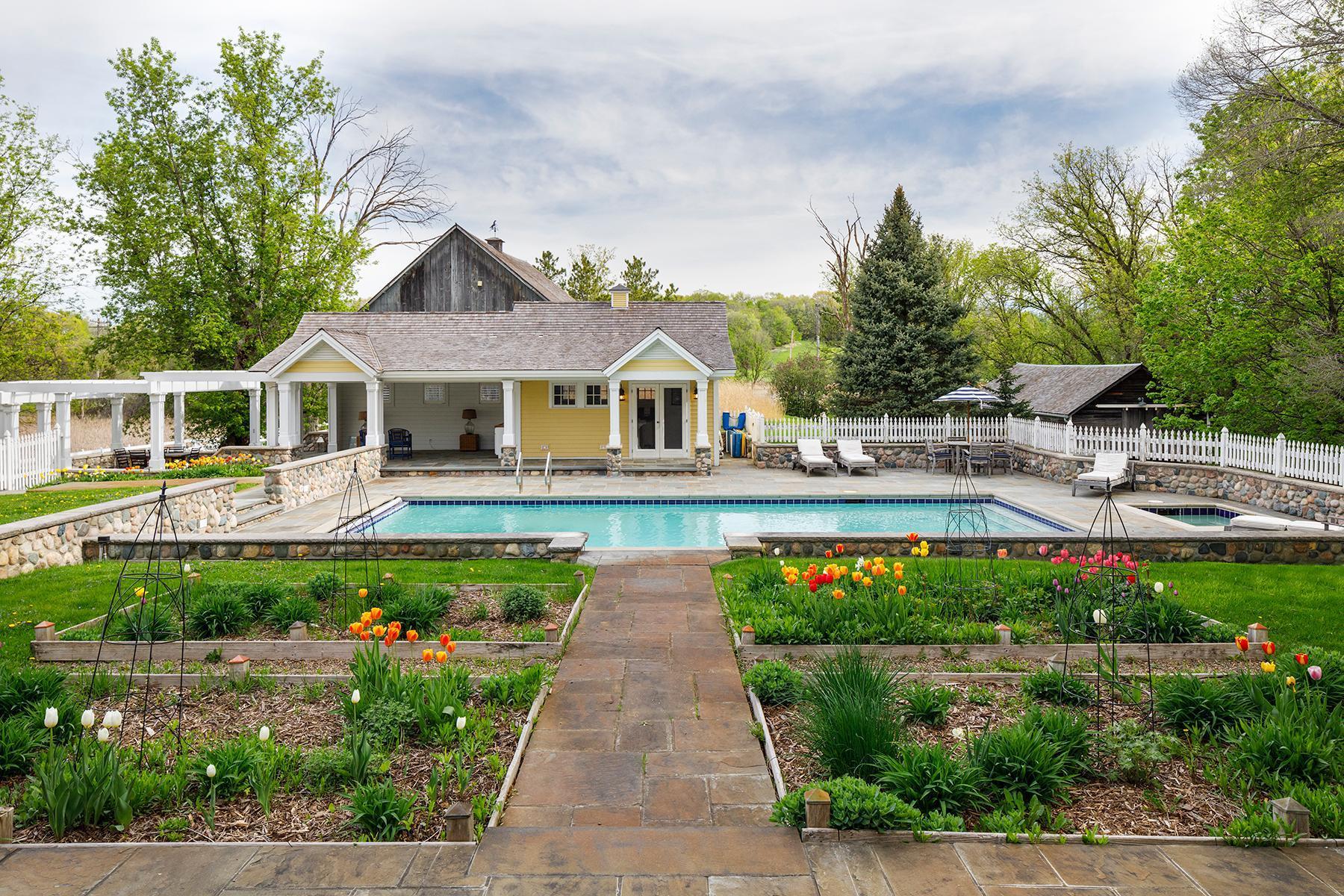 Stroll through the English Garden courtyard with pool.