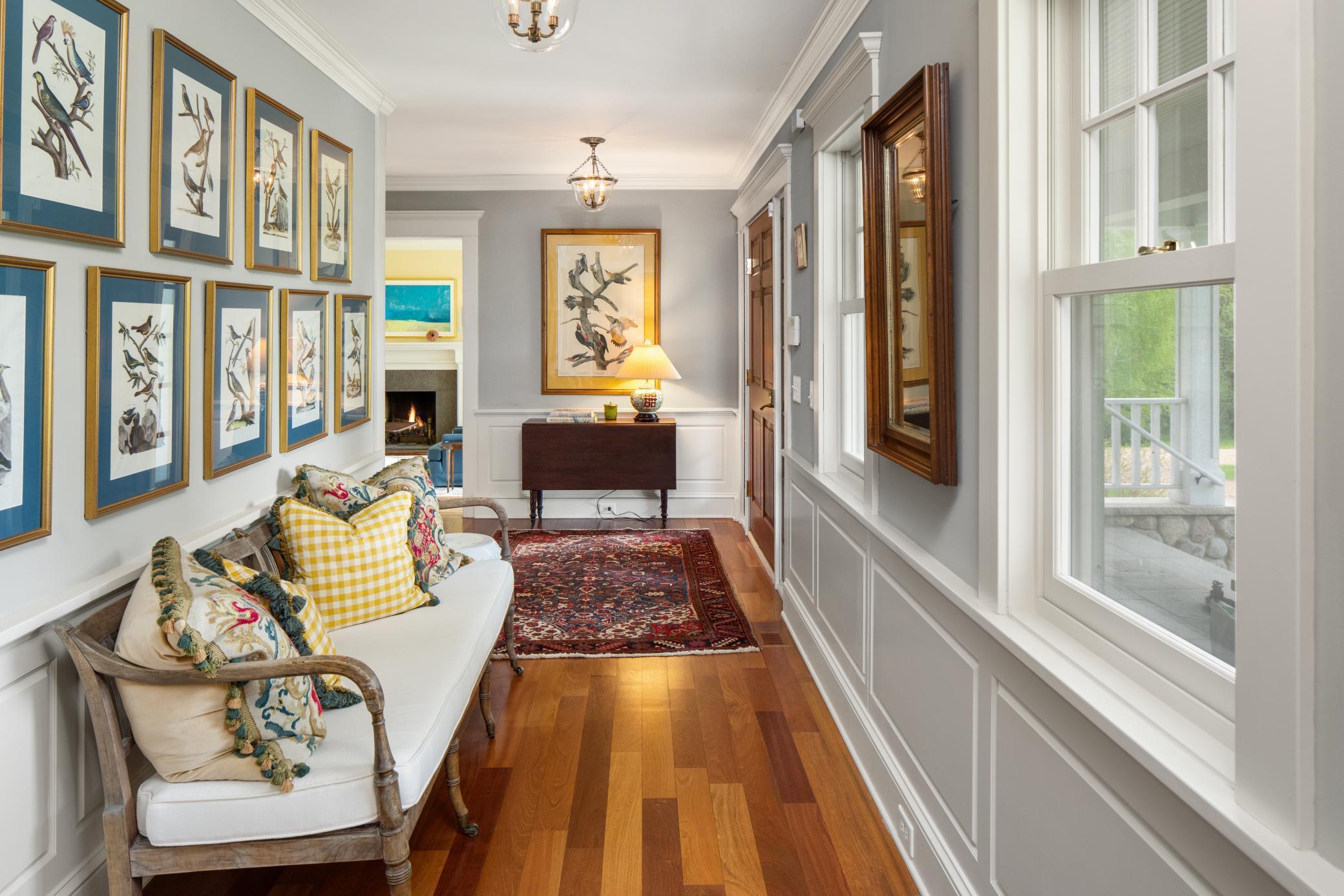 Front entry hallway leads you to formal dining.