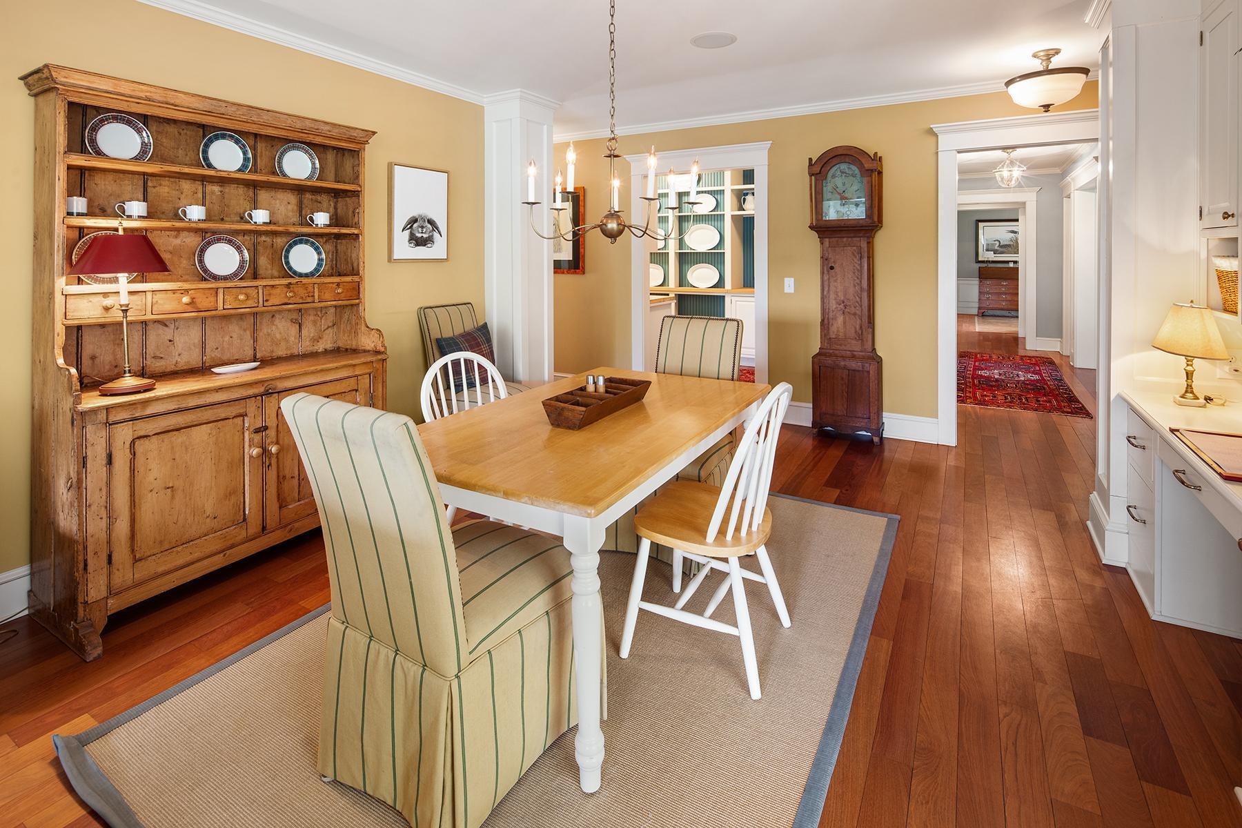 Informal dining room is open to Butler's Pantry