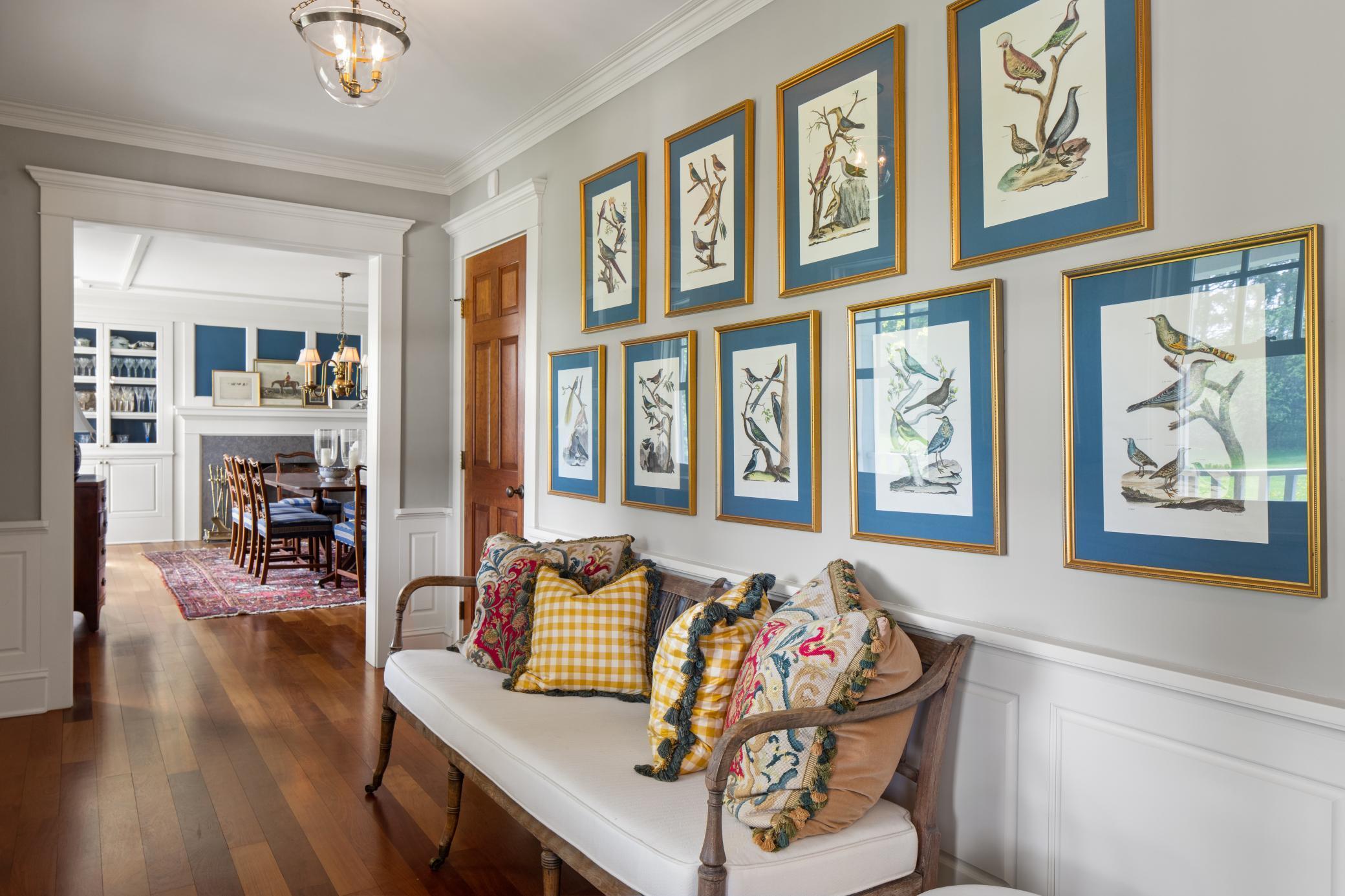Front entry hallway leads you to formal dining.