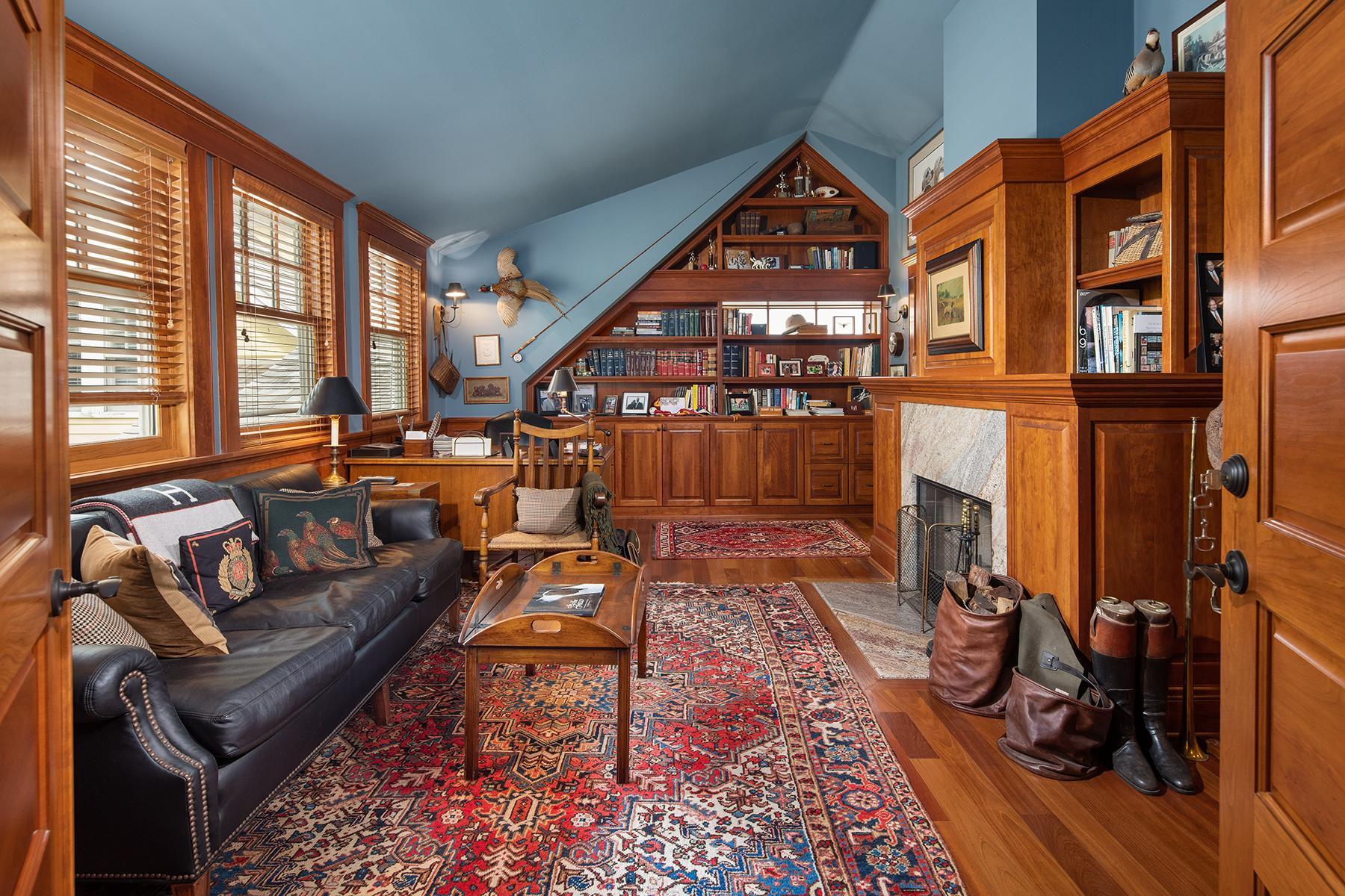 The English study offers a spacious executive home office and offers a private bathroom. Cherrywood paneled, wood burning fireplace, wet bar and countryside views complete this spectacular room.