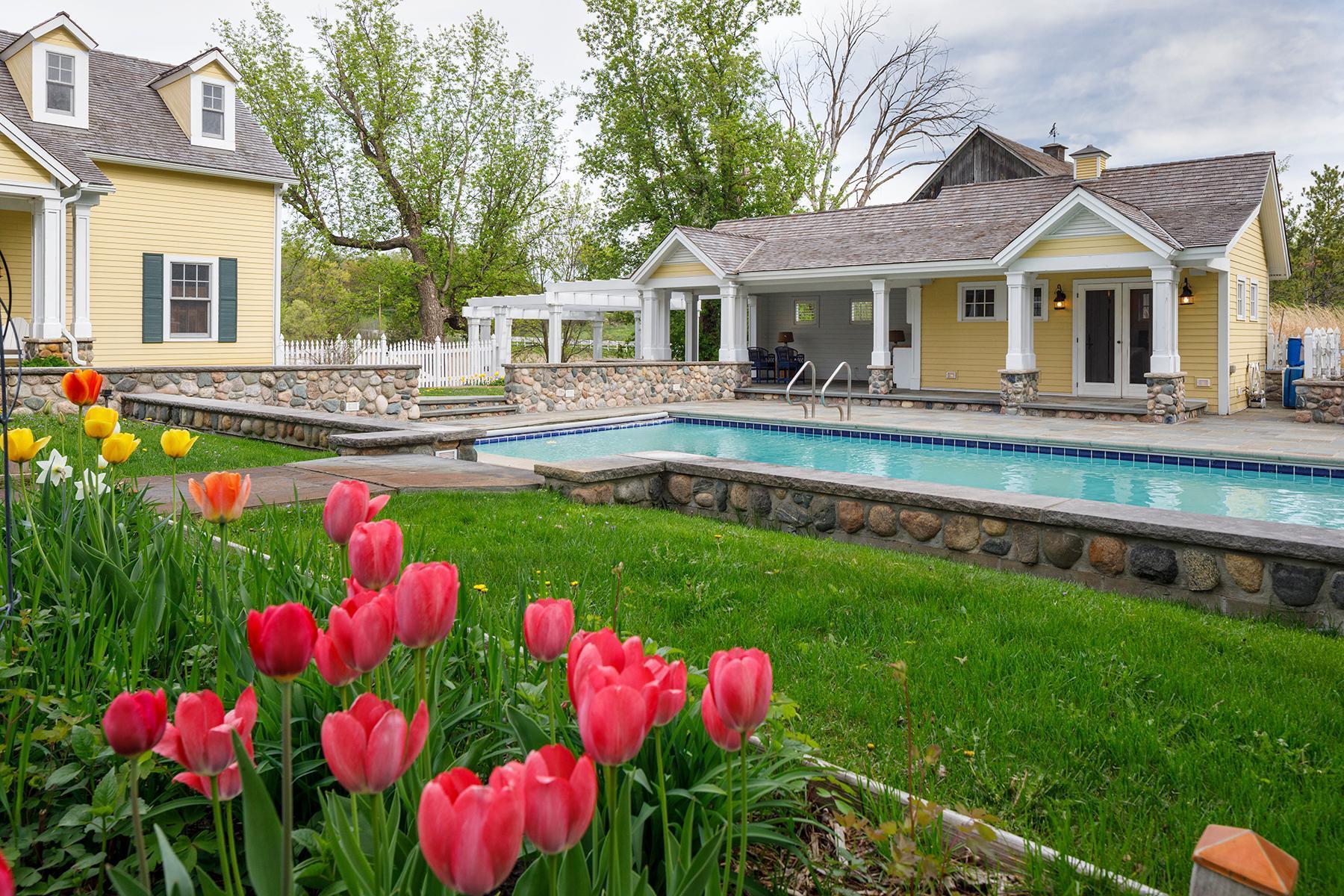 Pool house features locker room, bathroom and cabana. Heated 40x20 pool.