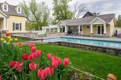 Pool house features locker room, bathroom and cabana. Heated 40x20 pool.
