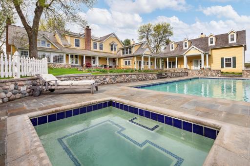 Ten-person hot tub on the pool deck and 40x20 heated pool.
