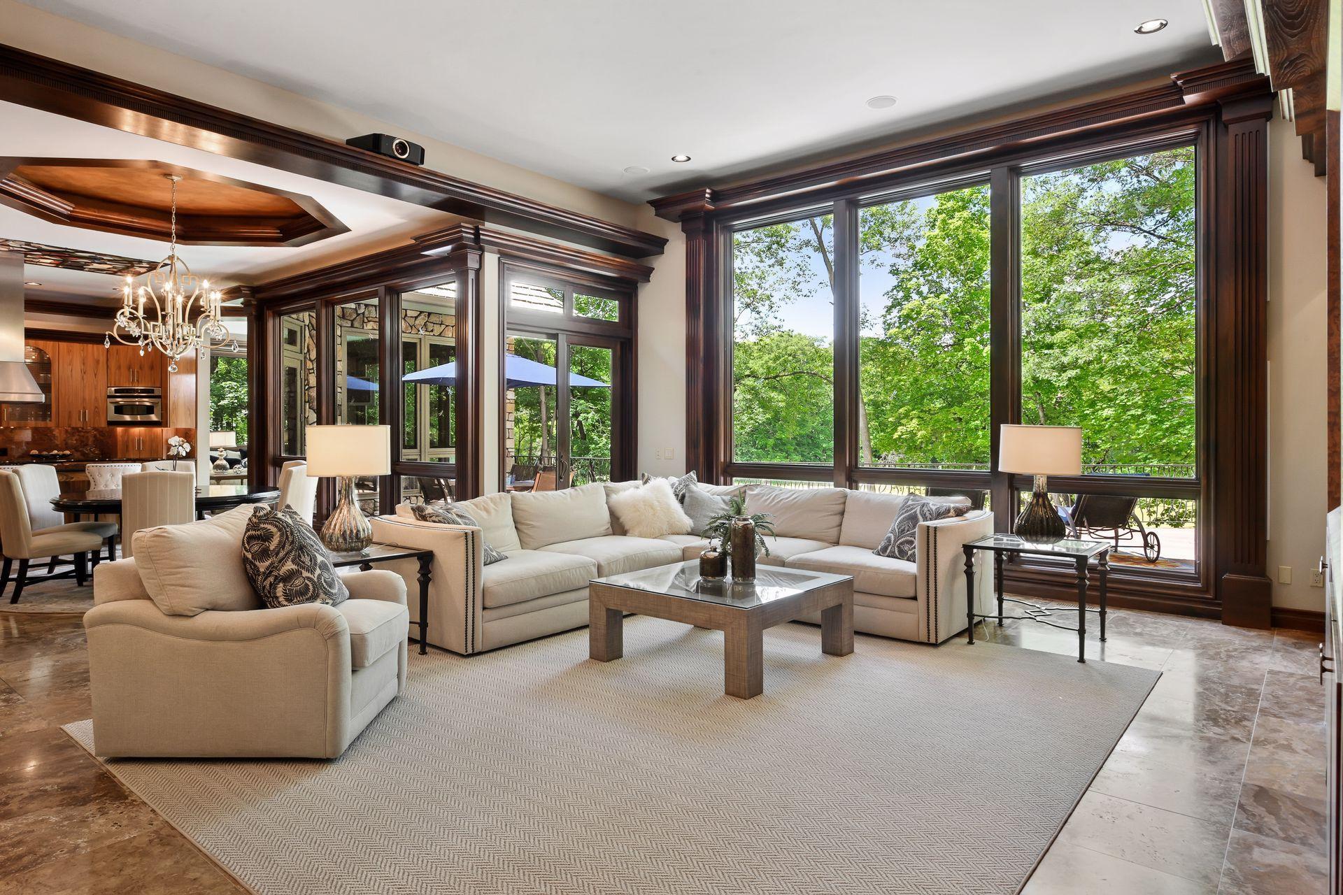 Floor to ceiling windows cover most of the west facing wall of the home.
