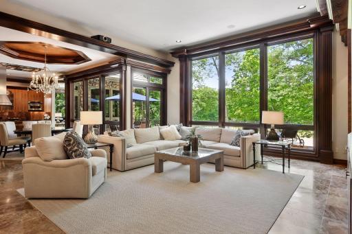 Floor to ceiling windows cover most of the west facing wall of the home.